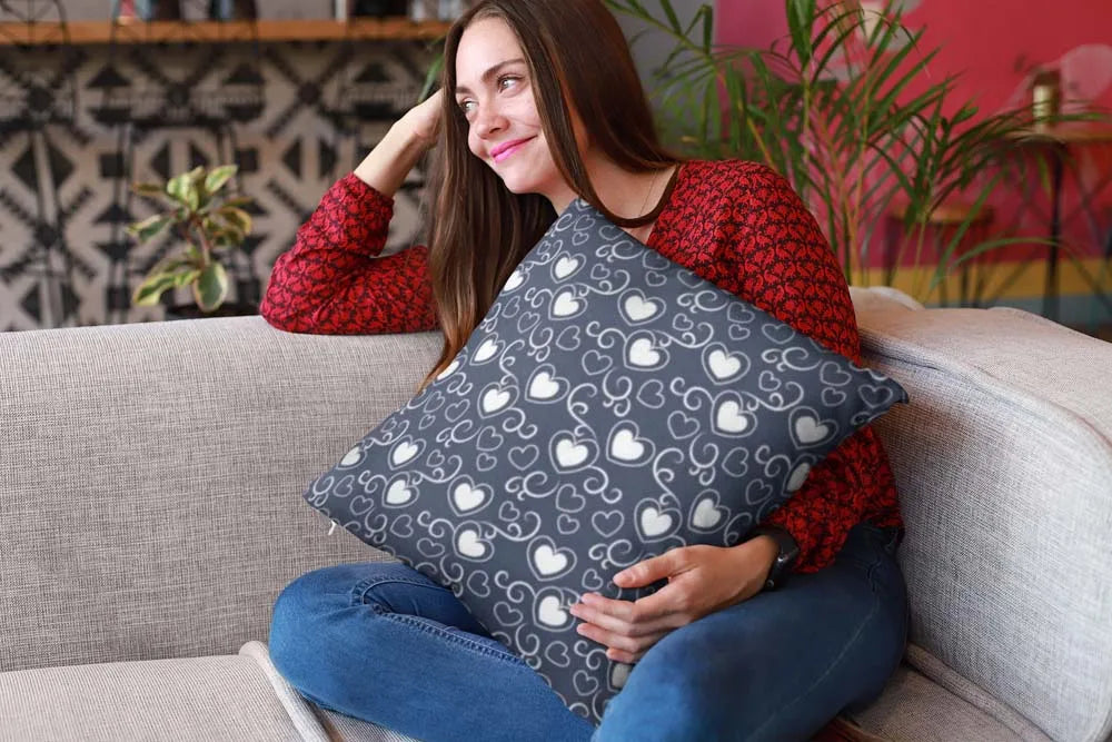mockup-of-a-happy-girl-holding-a-pillow-sitting-on-a-sofa-23607