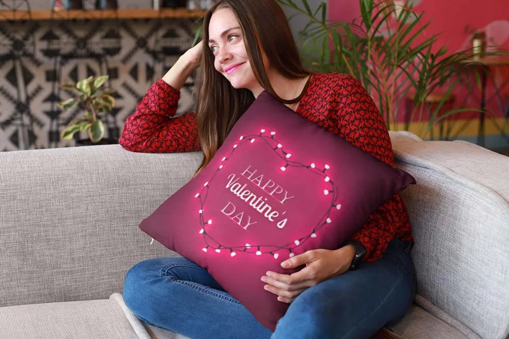 mockup-of-a-happy-girl-holding-a-pillow-sitting-on-a-sofa-23607