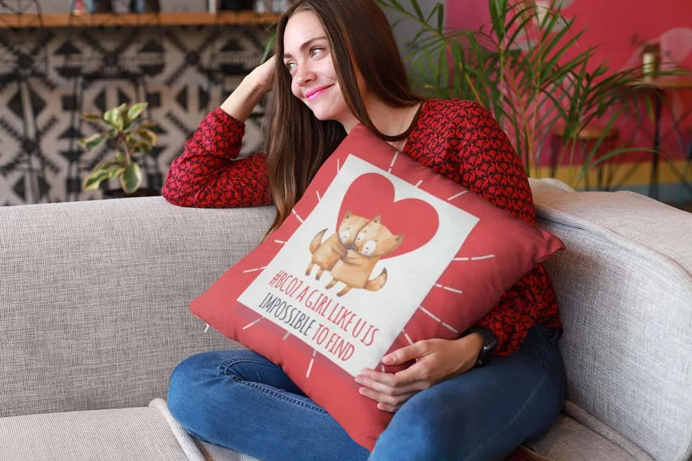 mockup-of-a-happy-girl-holding-a-pillow-sitting-on-a-sofa-23607