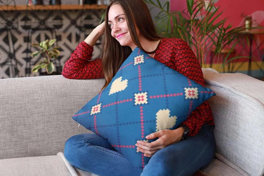 mockup-of-a-happy-girl-holding-a-pillow-sitting-on-a-sofa-23607