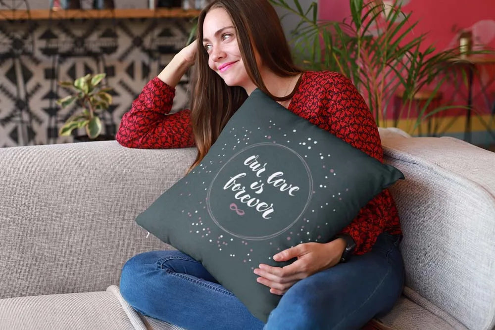 mockup-of-a-happy-girl-holding-a-pillow-sitting-on-a-sofa-23607