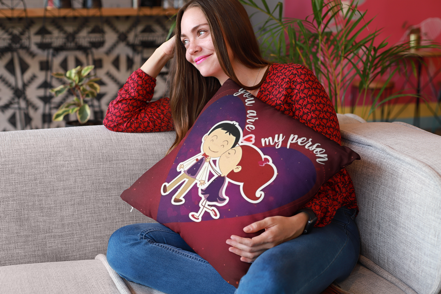 mockup-of-a-happy-girl-holding-a-pillow-sitting-on-a-sofa-23607