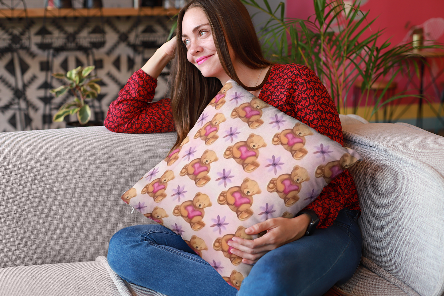 mockup-of-a-happy-girl-holding-a-pillow-sitting-on-a-sofa-23607