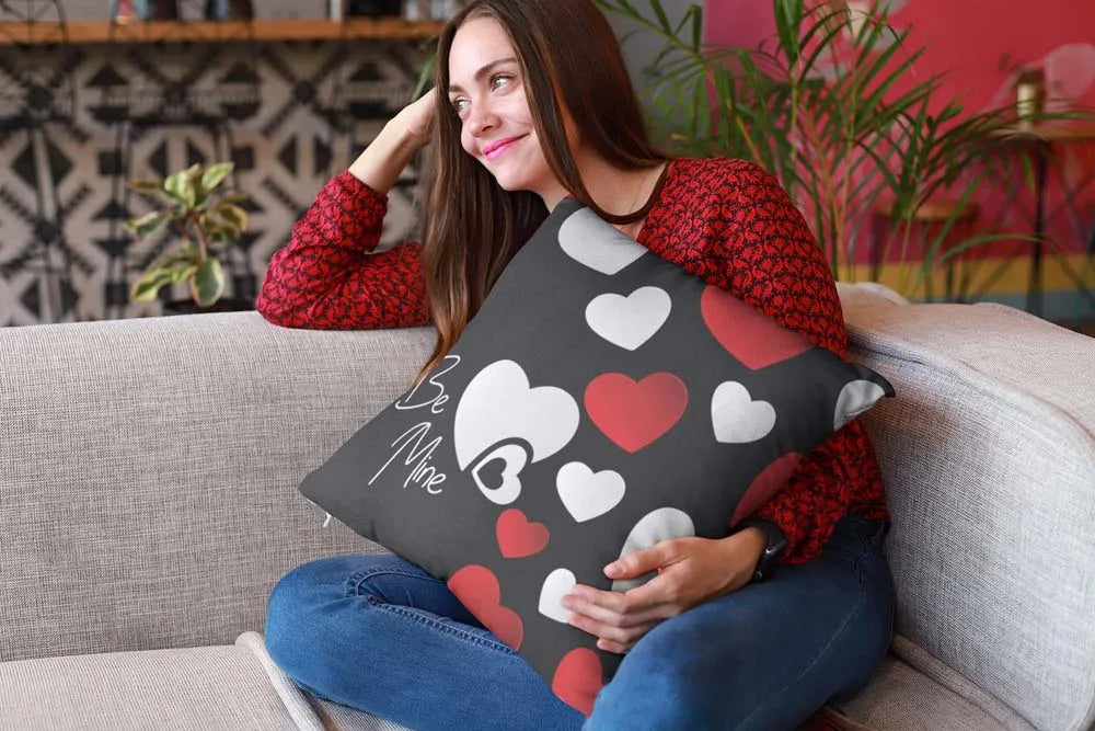 mockup-of-a-happy-girl-holding-a-pillow-sitting-on-a-sofa-23607_1