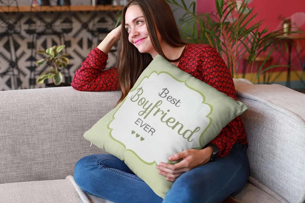 mockup-of-a-happy-girl-holding-a-pillow-sitting-on-a-sofa-23607_2