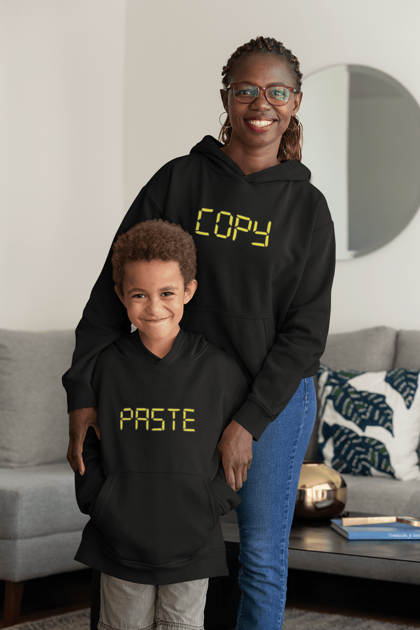 mockup-of-a-kid-and-his-mom-wearing-pullover-hoodies-32640.png