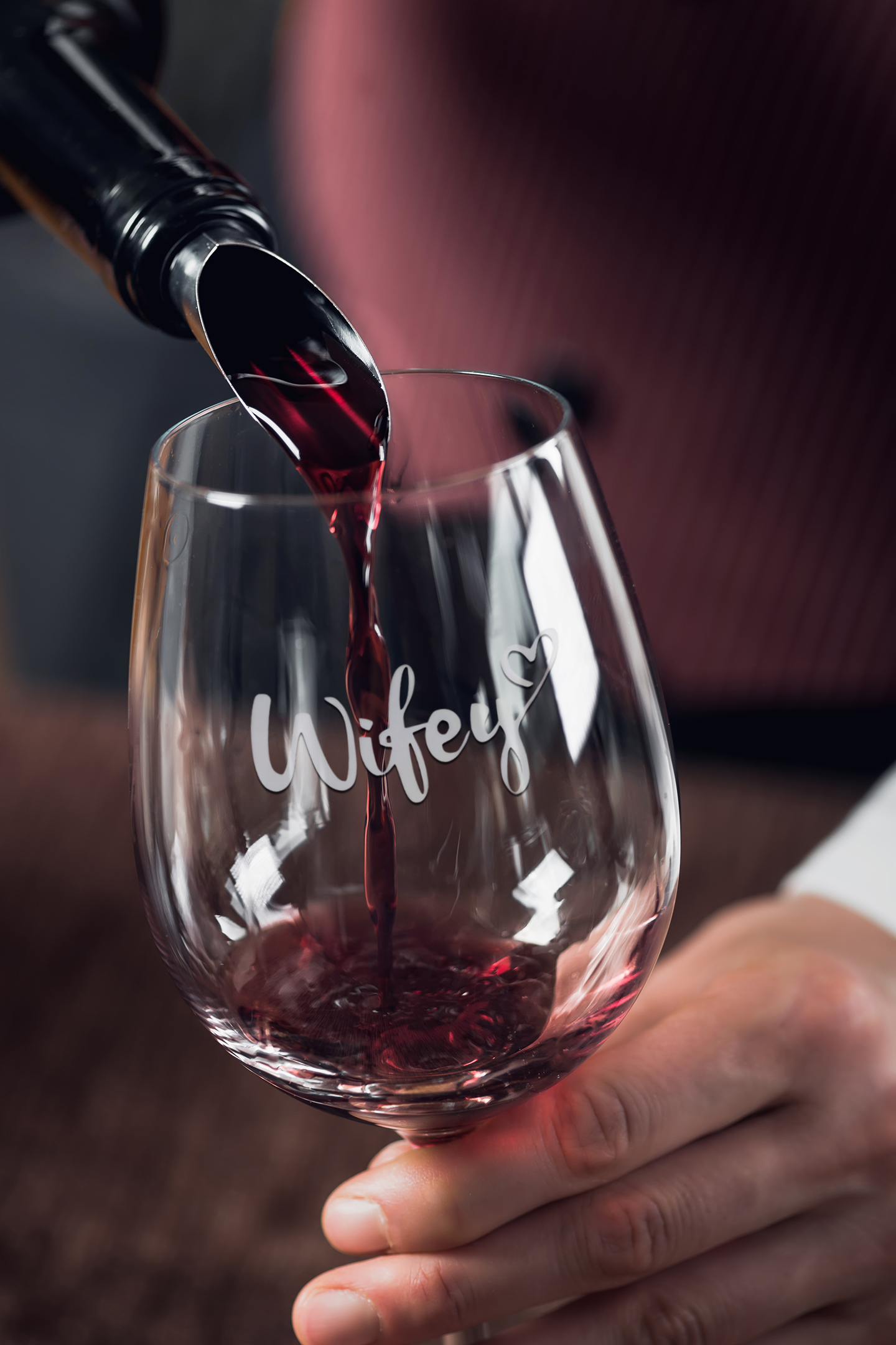 mockup-of-a-man-pouring-wine-in-a-stemless-wine-glass-36811-r-el2