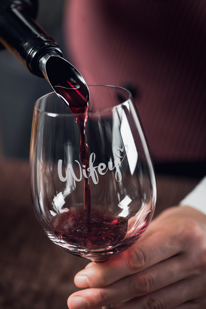 mockup-of-a-man-pouring-wine-in-a-stemless-wine-glass-36811-r-el2