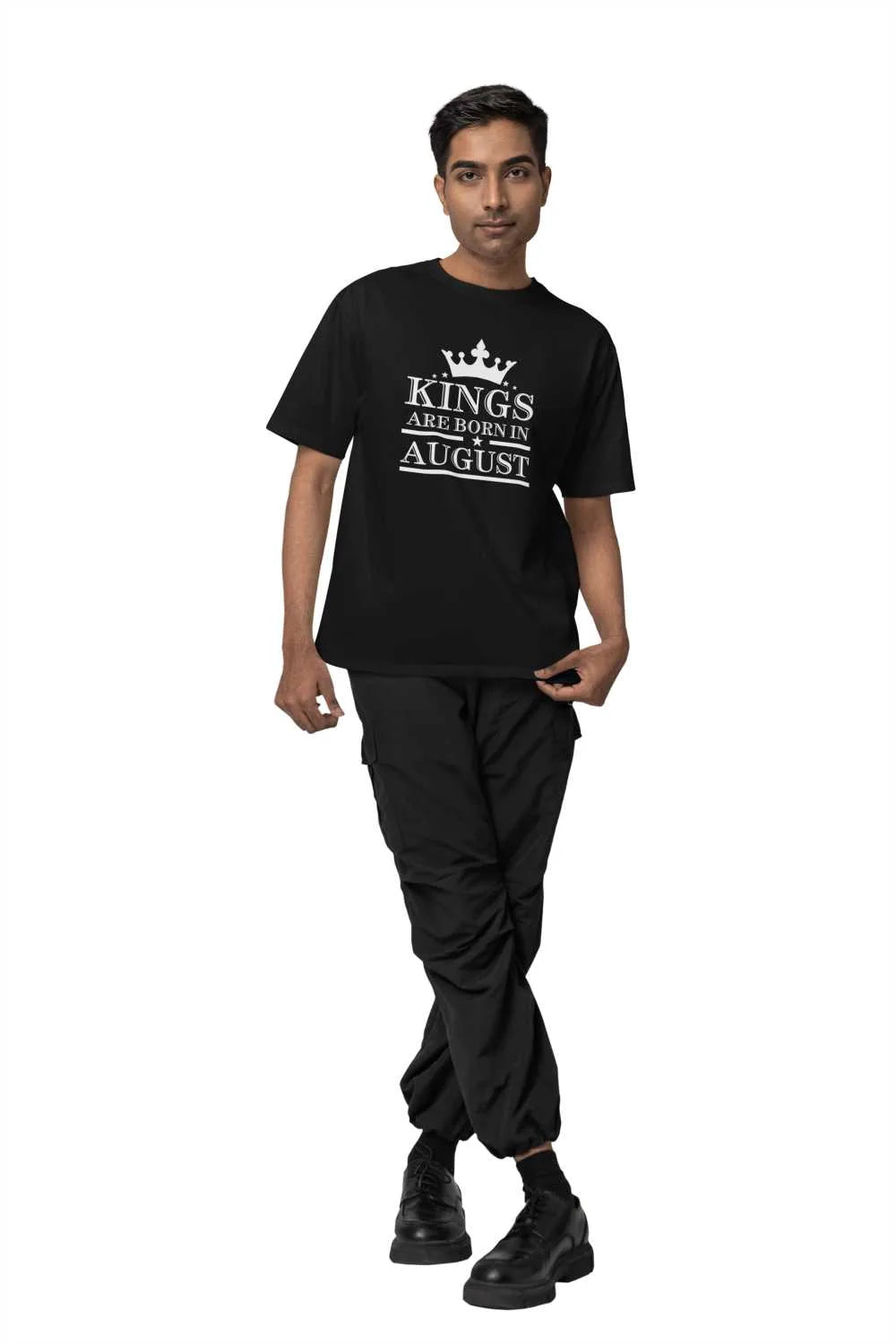 mockup-of-a-man-standing-in-a-studio-wearing-a-rounded-neck-t-shirt-from-blinkstore-m37665