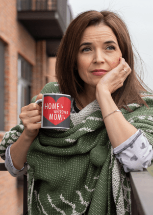 mockup-of-a-middle-aged-woman-holding-an-11-oz-coffee-mug-outside-31600-10