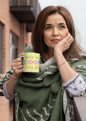 mockup-of-a-middle-aged-woman-holding-an-11-oz-coffee-mug-outside-31600-6-1