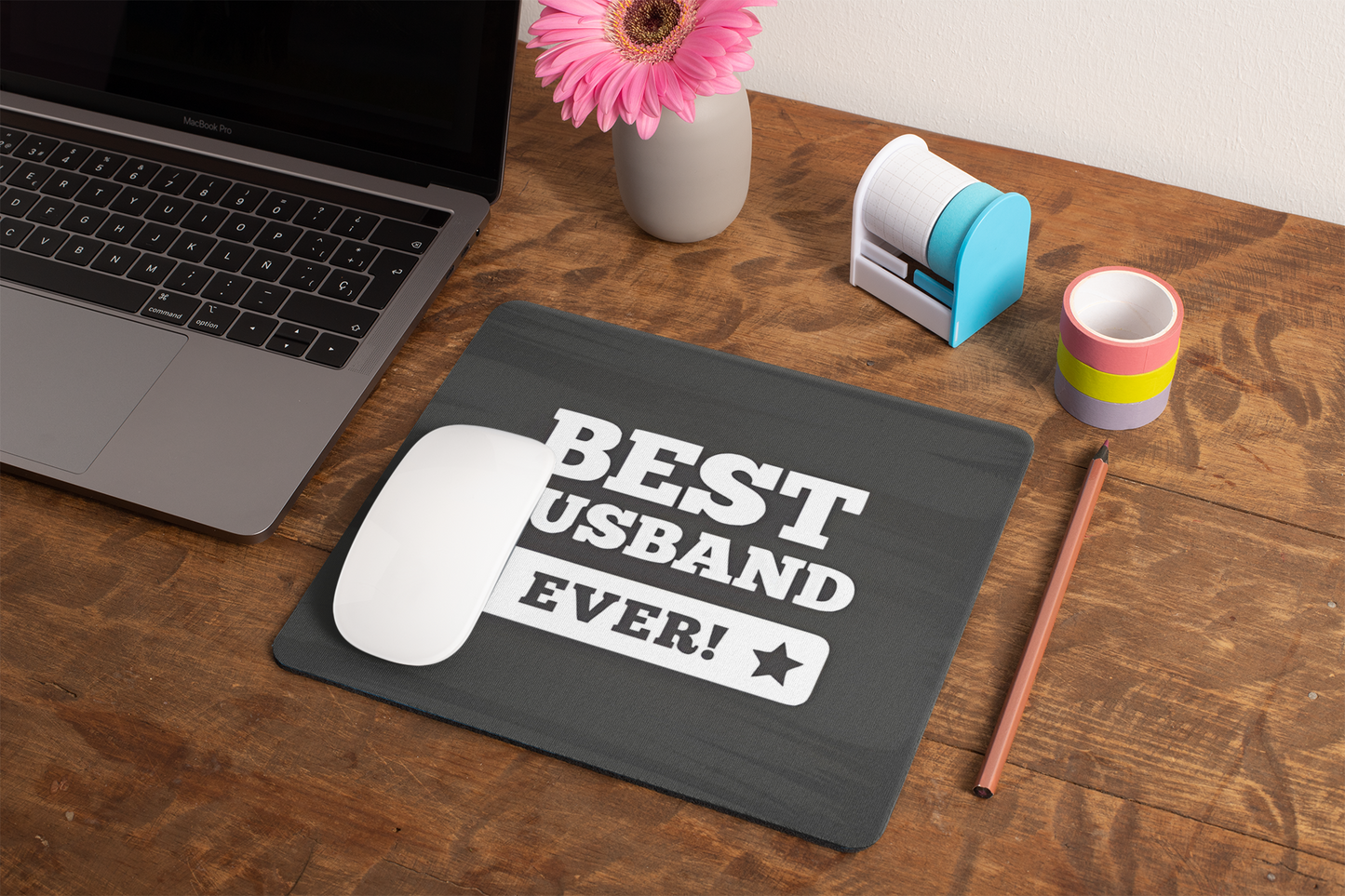 mockup-of-a-mousepad-lying-on-a-rustic-table-next-to-a-flower-vase-27554 (1)
