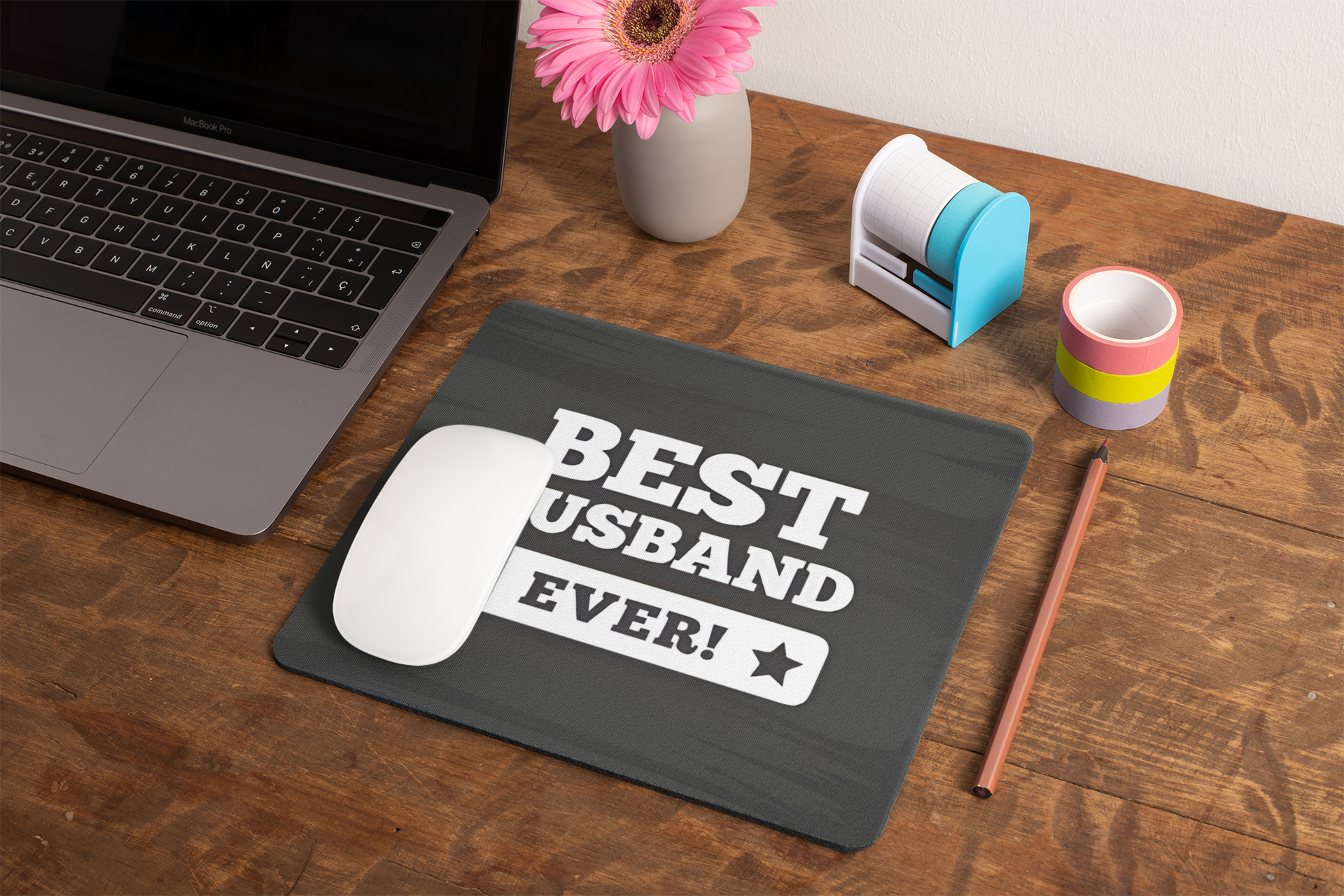 mockup-of-a-mousepad-lying-on-a-rustic-table-next-to-a-flower-vase-27554 (1)