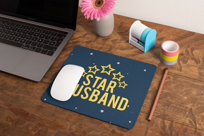 mockup-of-a-mousepad-lying-on-a-rustic-table-next-to-a-flower-vase-27554 (1)