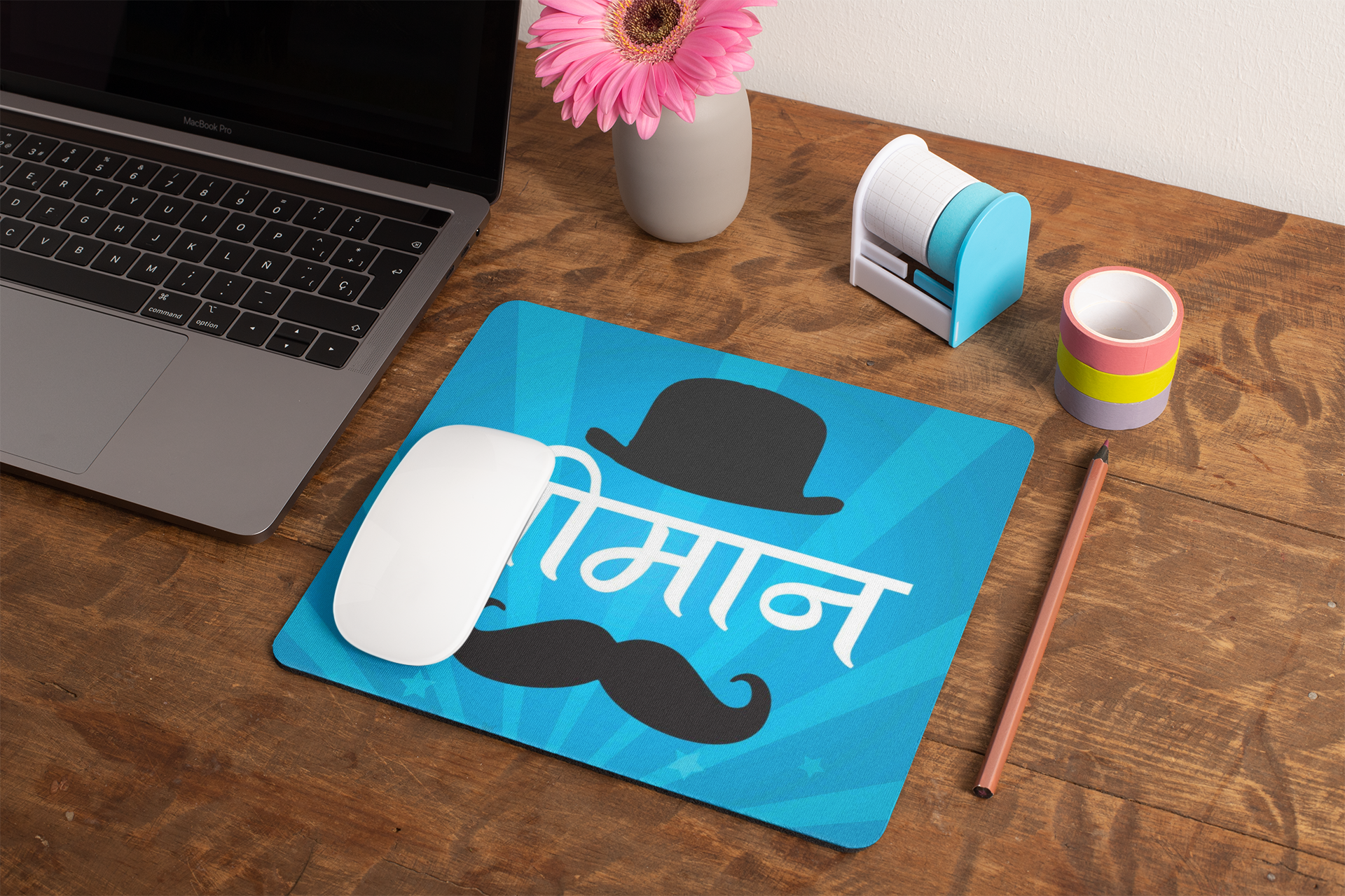 mockup-of-a-mousepad-lying-on-a-rustic-table-next-to-a-flower-vase-27554