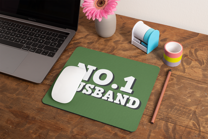 mockup-of-a-mousepad-lying-on-a-rustic-table-next-to-a-flower-vase-27554