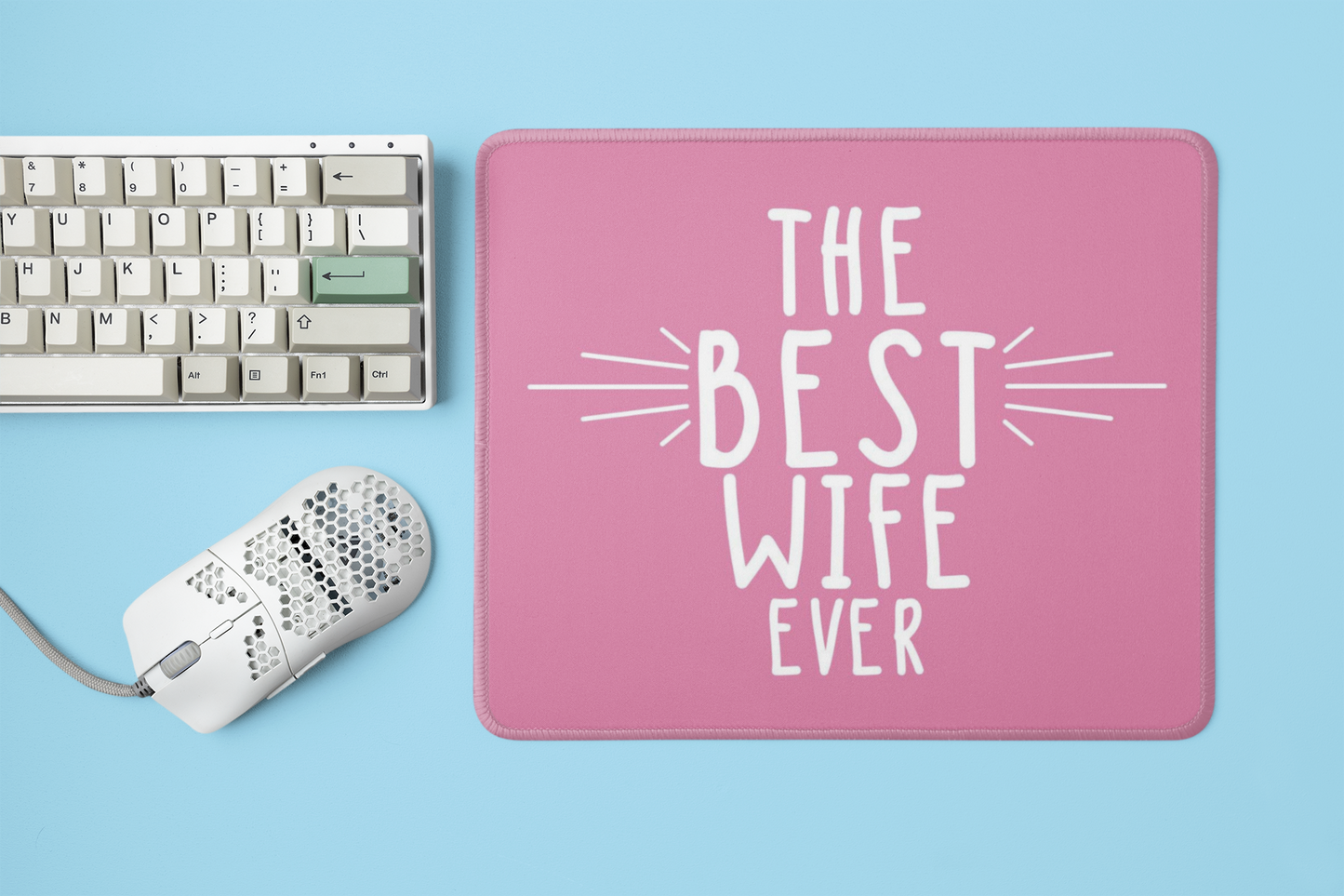mockup-of-a-mousepad-placed-next-to-a-mechanical-keyboard-and-a-mouse-m23225 (1)