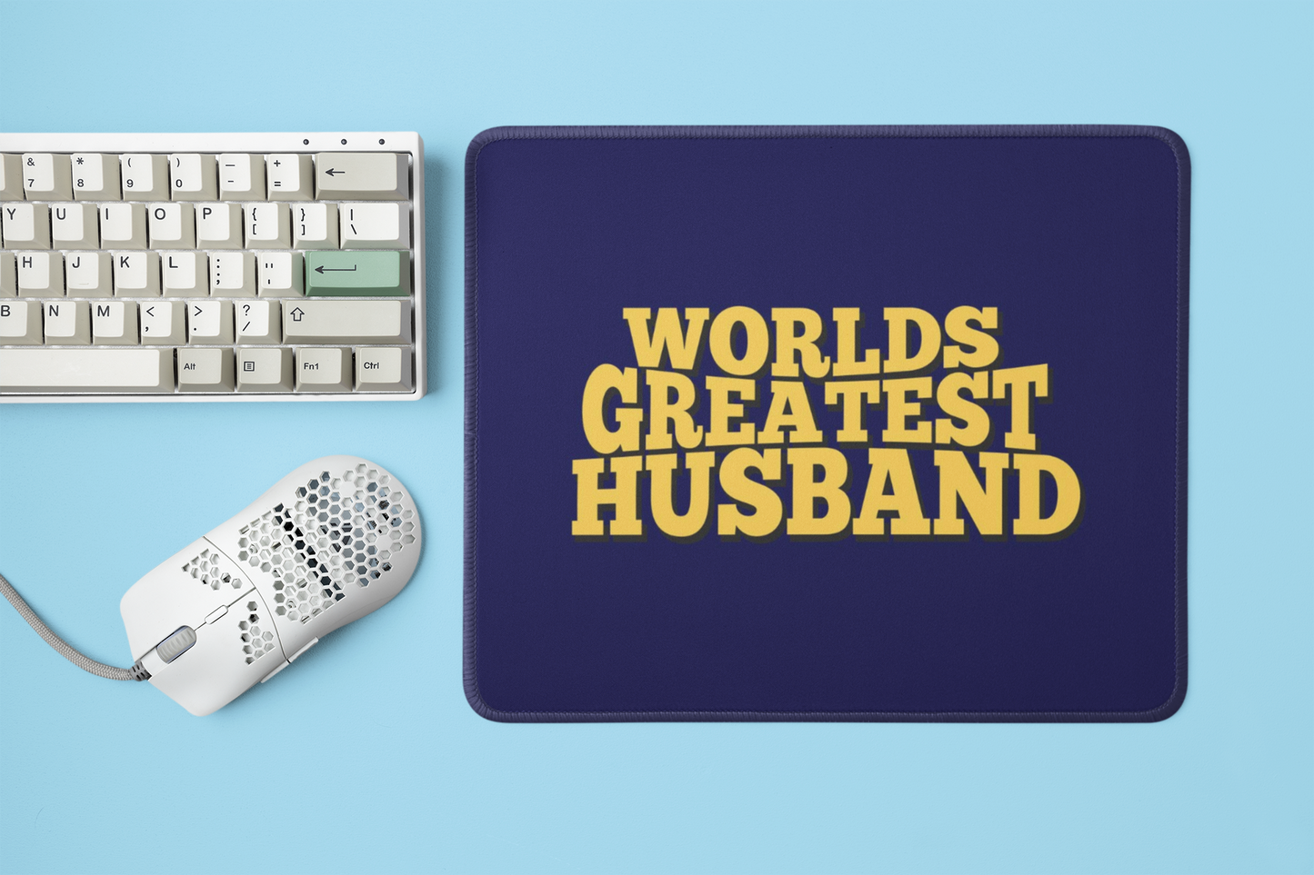 mockup-of-a-mousepad-placed-next-to-a-mechanical-keyboard-and-a-mouse-m23225 (1)