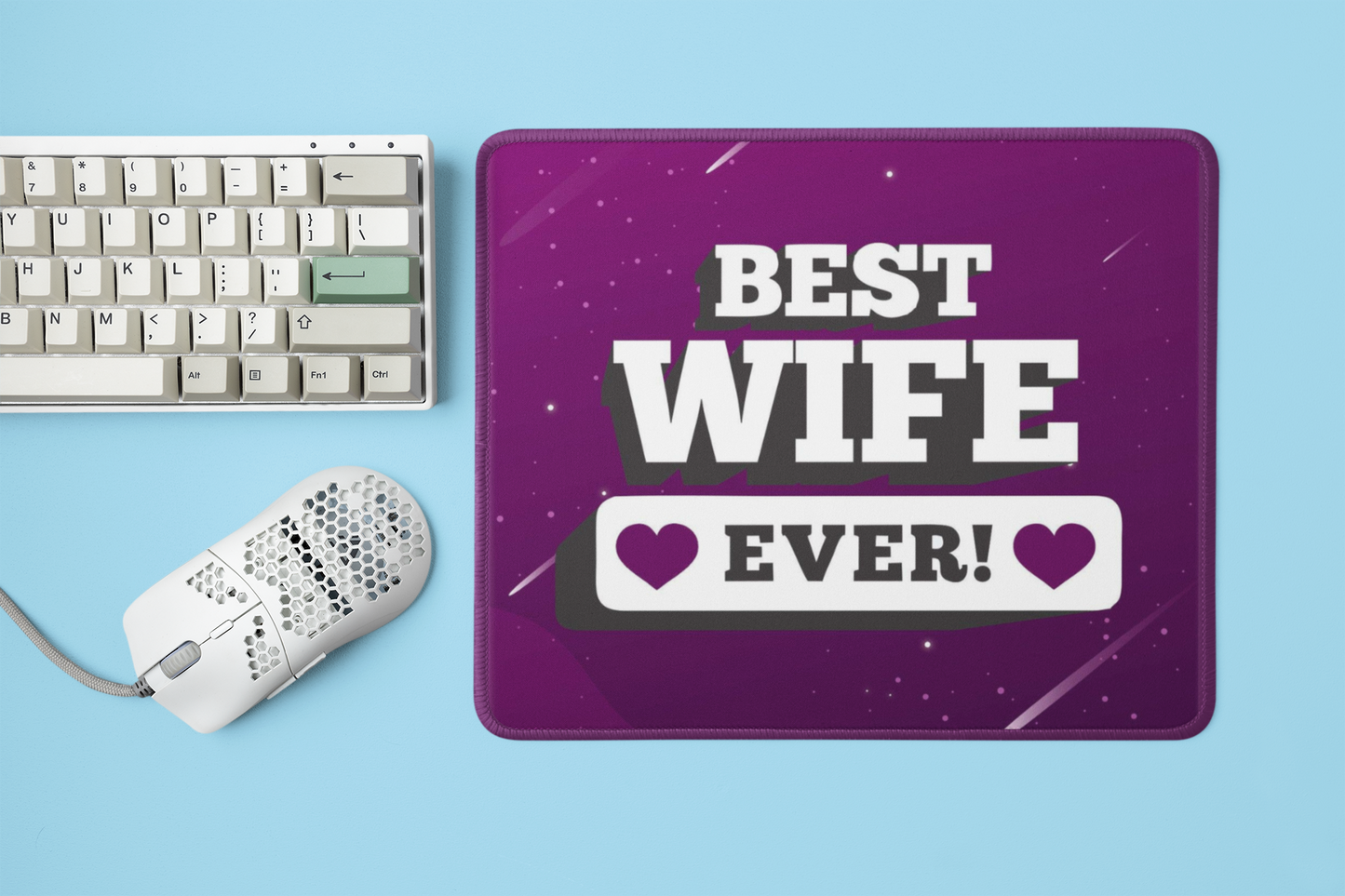 mockup-of-a-mousepad-placed-next-to-a-mechanical-keyboard-and-a-mouse-m23225 (1)