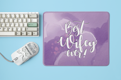 mockup-of-a-mousepad-placed-next-to-a-mechanical-keyboard-and-a-mouse-m23225