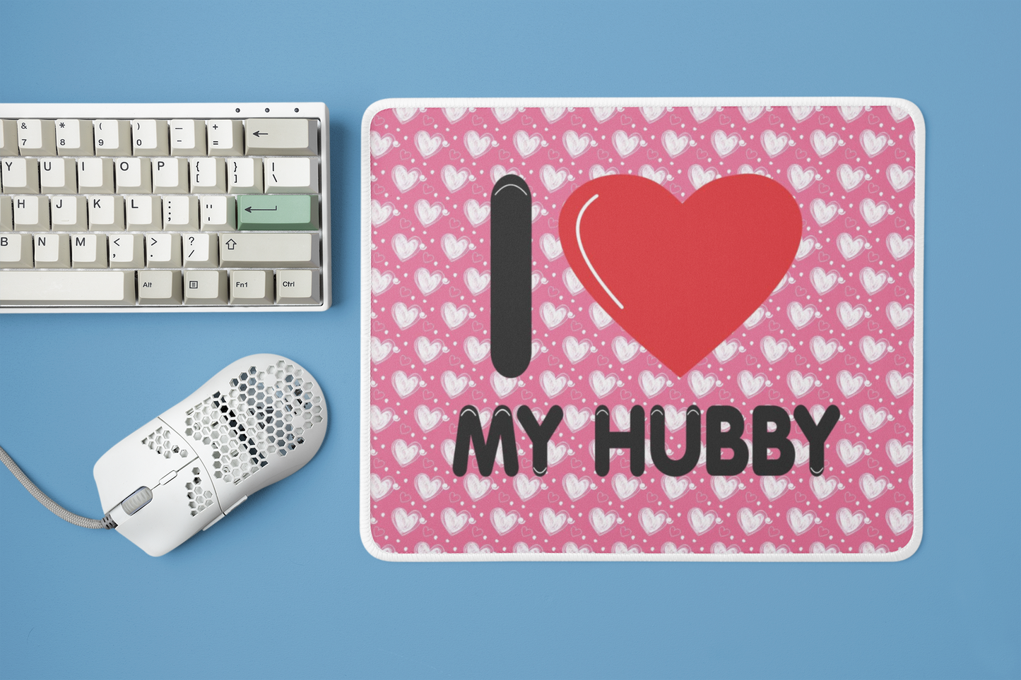 mockup-of-a-mousepad-placed-next-to-a-mechanical-keyboard-and-a-mouse-m23225