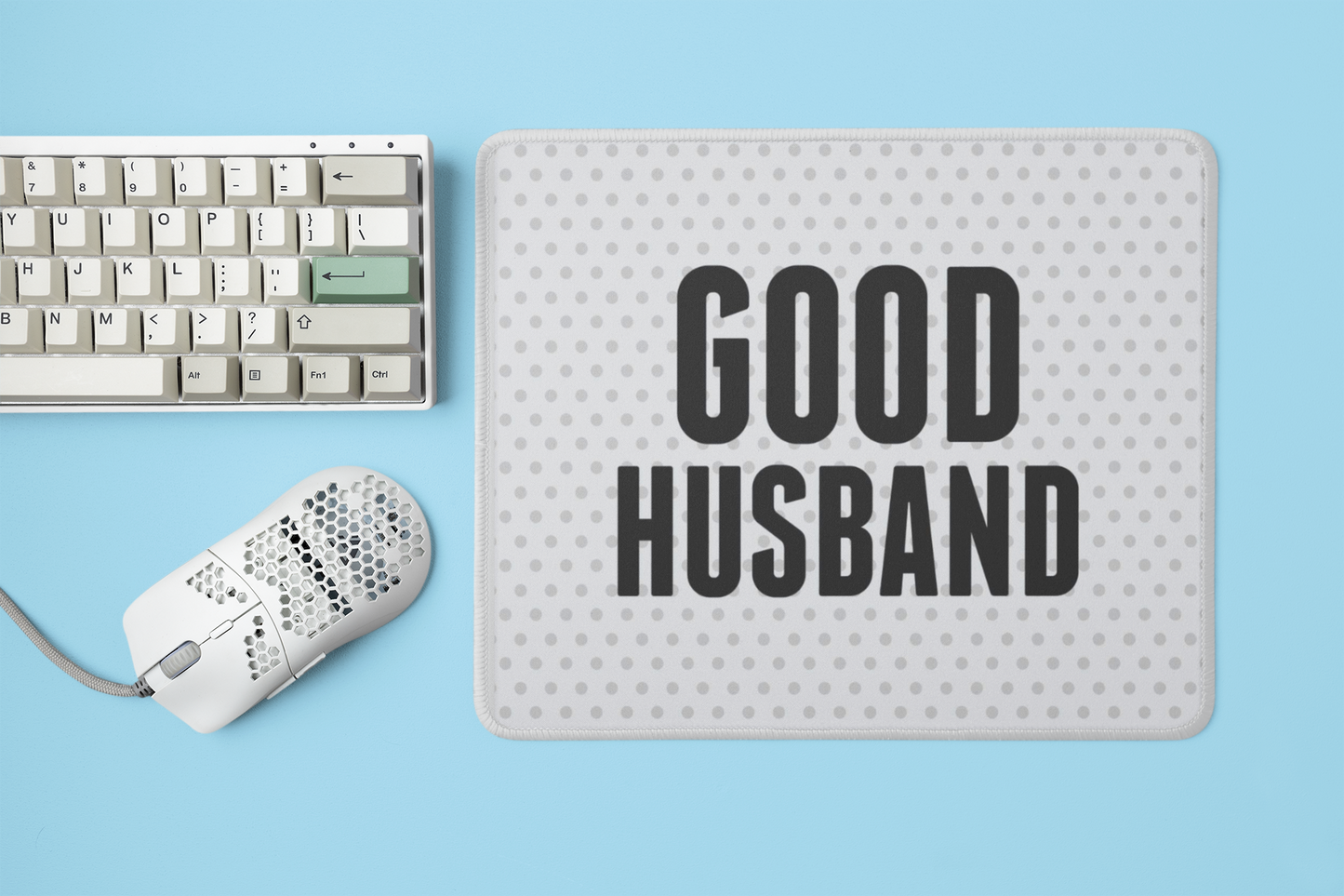 mockup-of-a-mousepad-placed-next-to-a-mechanical-keyboard-and-a-mouse-m23225