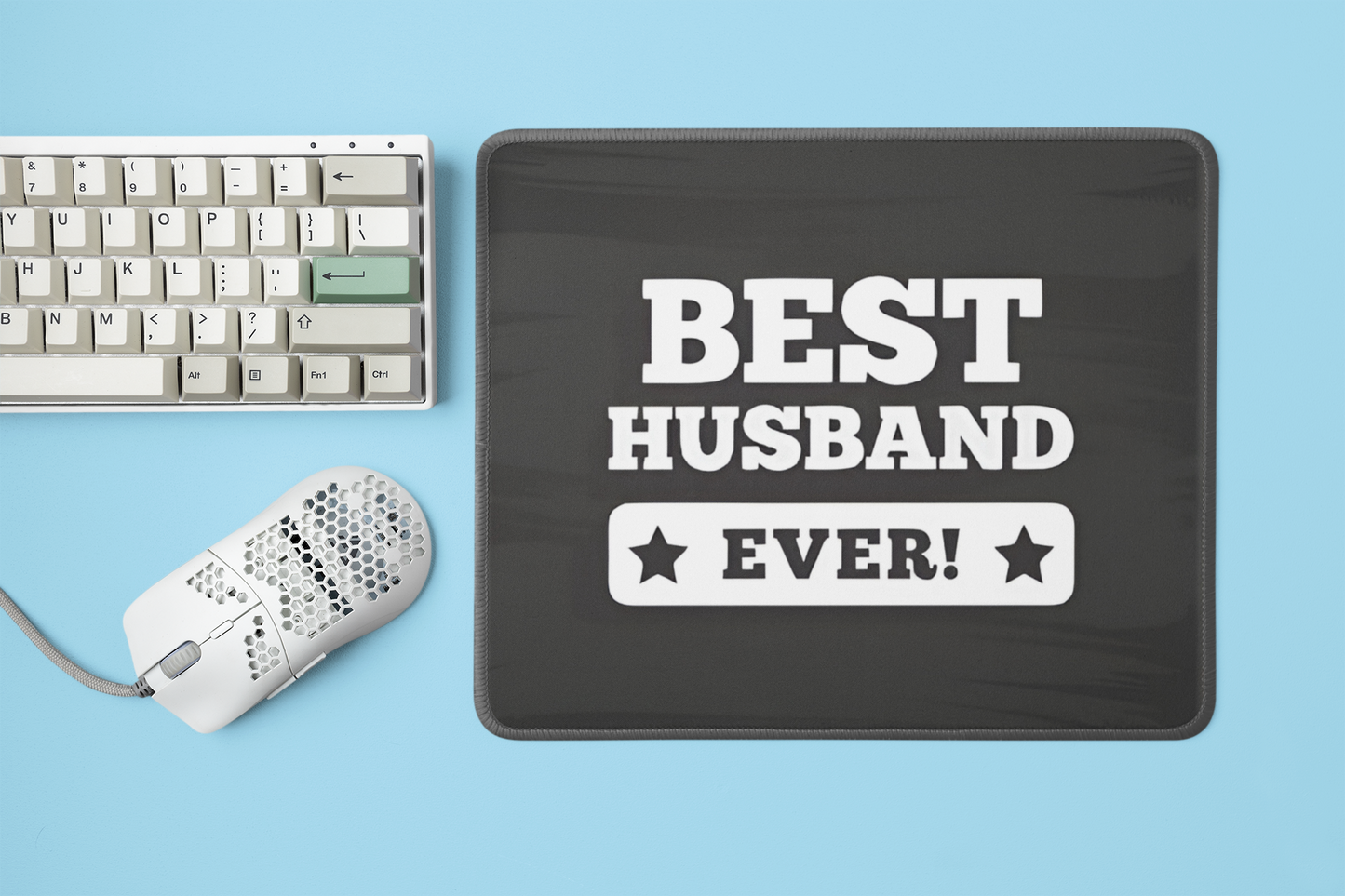 mockup-of-a-mousepad-placed-next-to-a-mechanical-keyboard-and-a-mouse-m23225