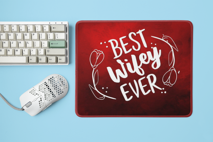 mockup-of-a-mousepad-placed-next-to-a-mechanical-keyboard-and-a-mouse-m23225