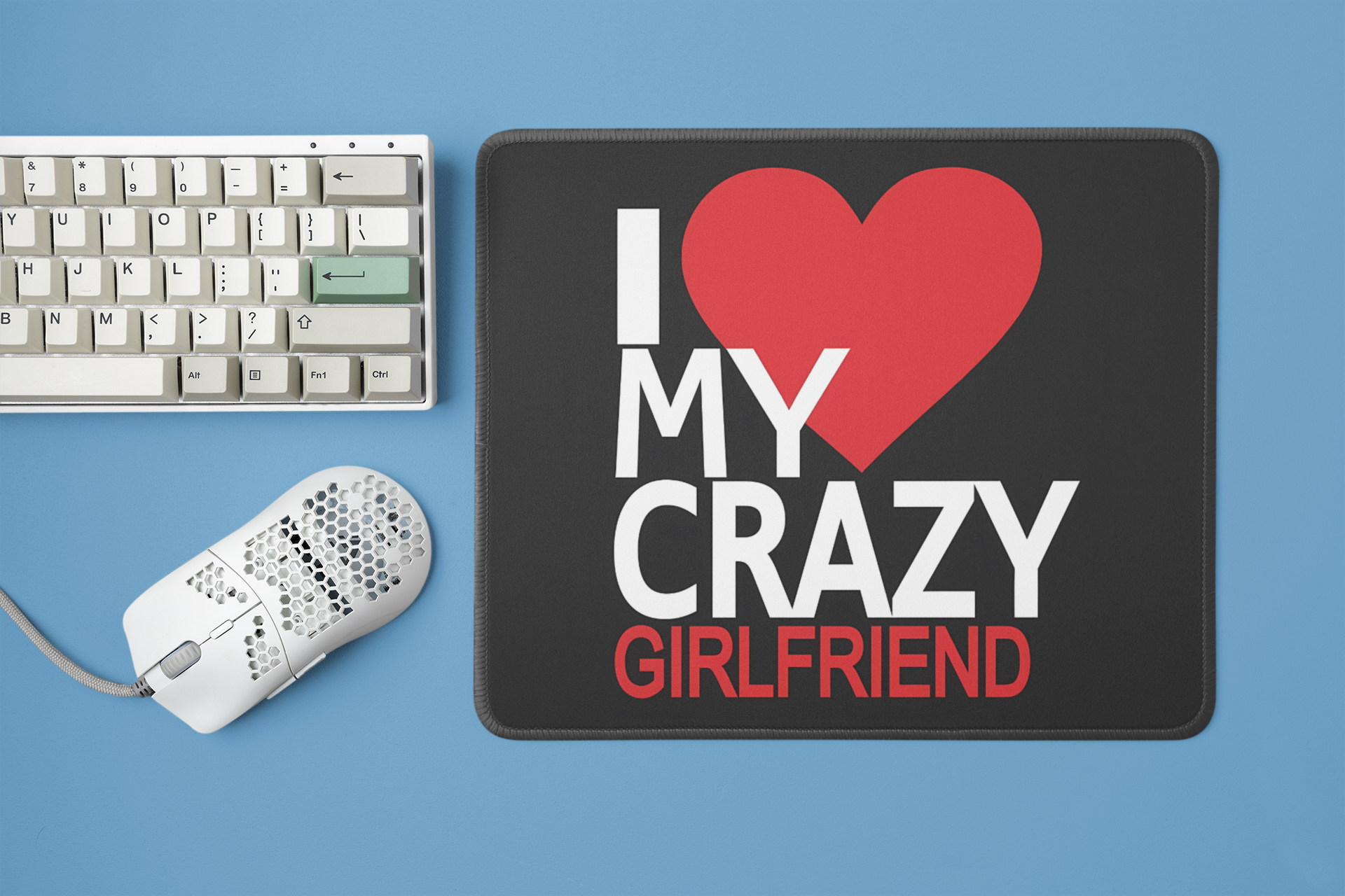mockup-of-a-mousepad-placed-next-to-a-mechanical-keyboard-and-a-mouse-m23225