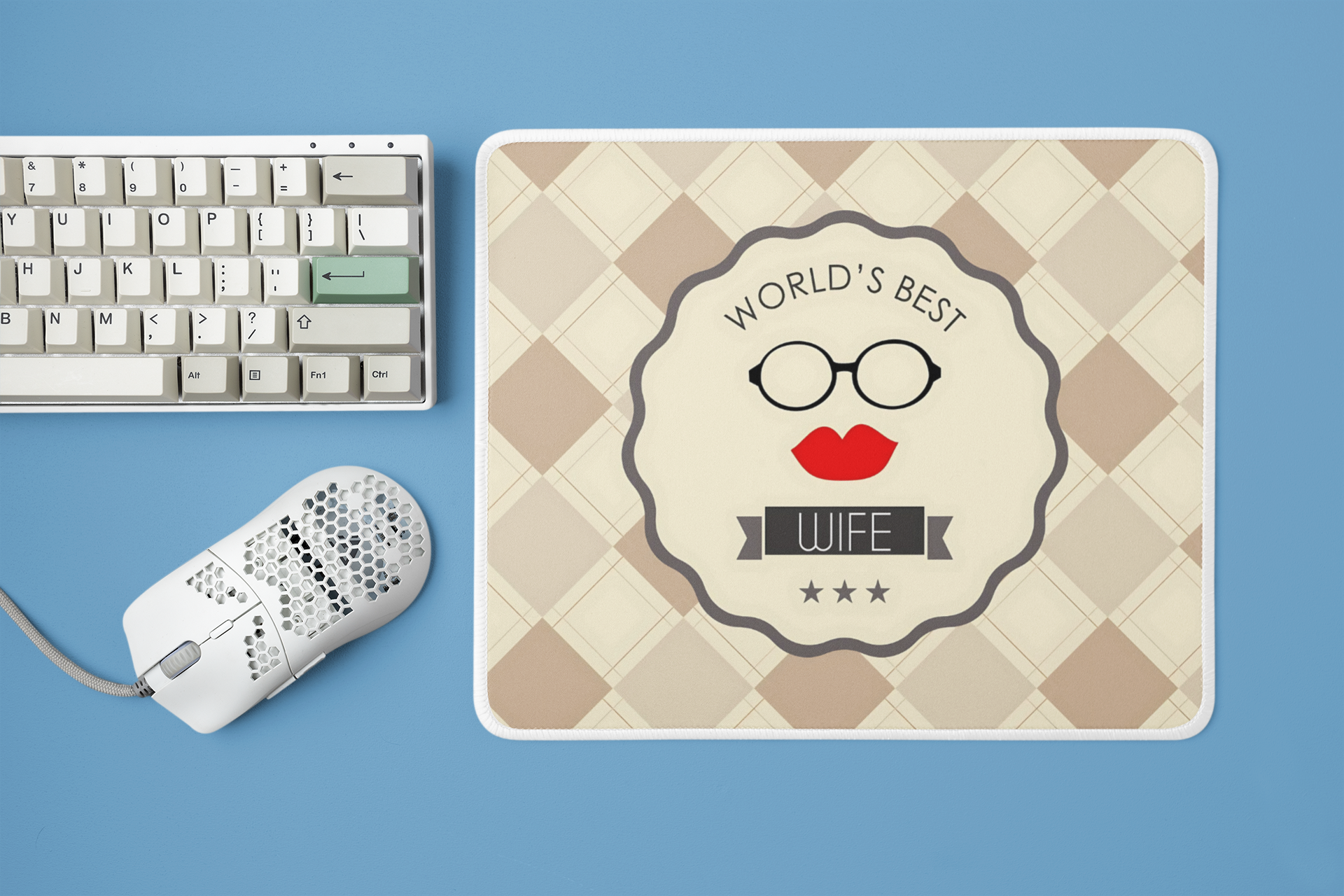 mockup-of-a-mousepad-placed-next-to-a-mechanical-keyboard-and-a-mouse-m23225