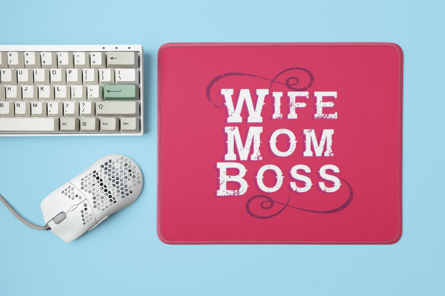 mockup-of-a-mousepad-placed-next-to-a-mechanical-keyboard-and-a-mouse-m23225