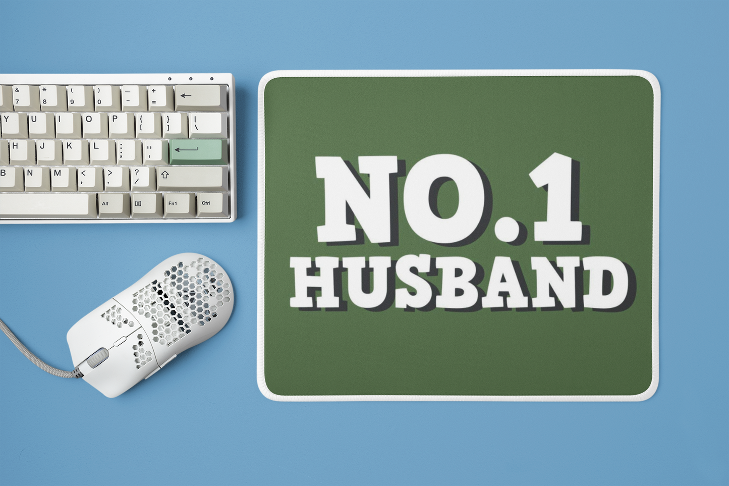 mockup-of-a-mousepad-placed-next-to-a-mechanical-keyboard-and-a-mouse-m23225