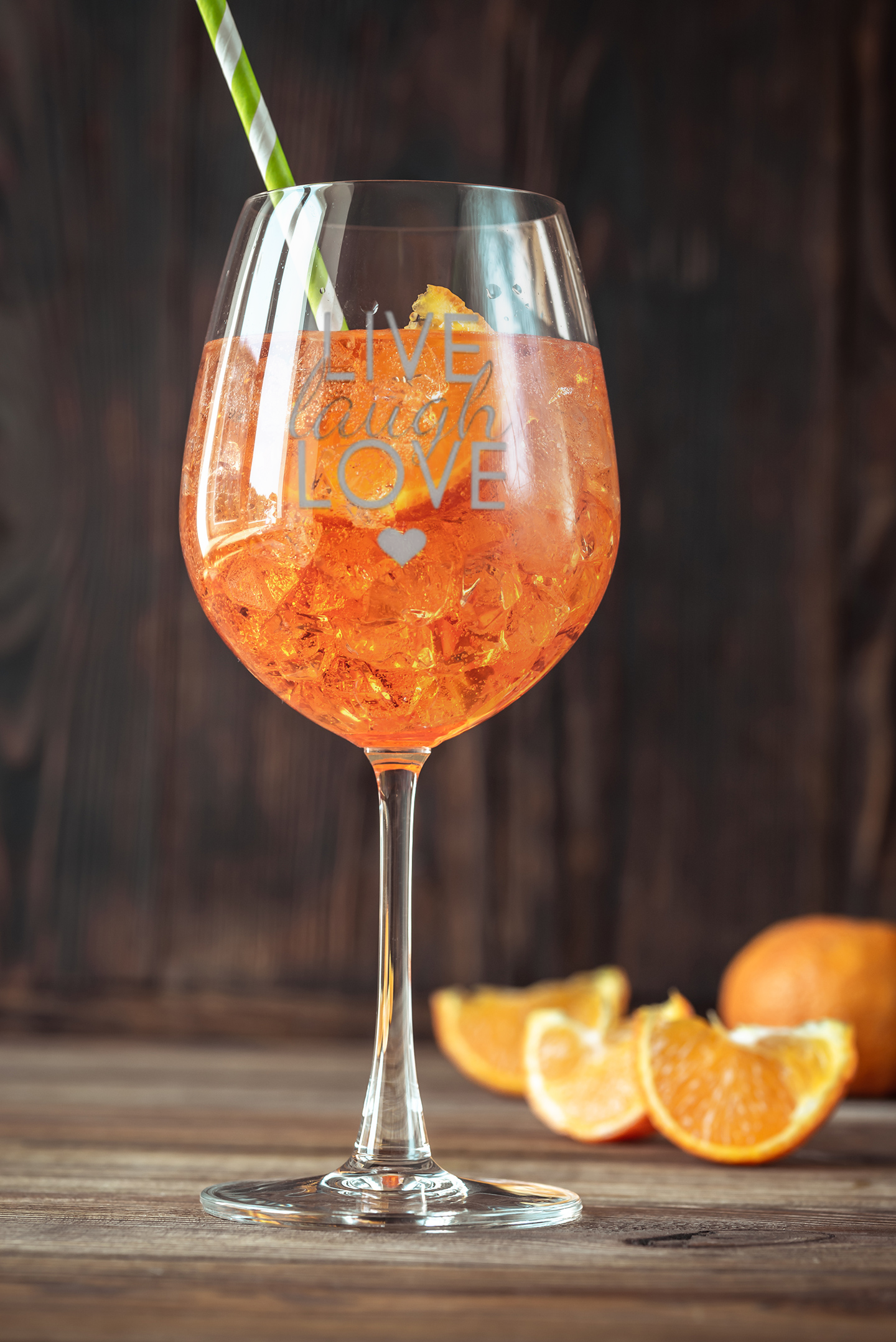 mockup-of-a-wine-glass-filled-with-a-cold-orange-drink-36618-r-el2 (1)
