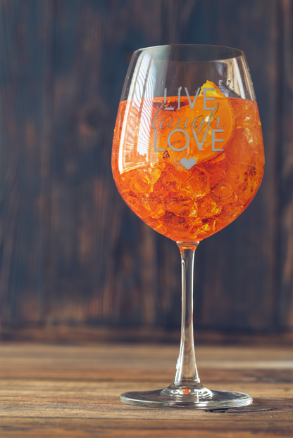 mockup-of-a-wine-glass-with-an-orange-infused-drink-36617-r-el2