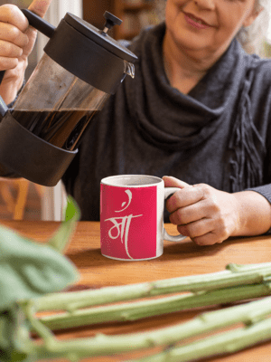 mockup-of-a-woman-pouring-coffee-into-a-mug-at-home-32205-1