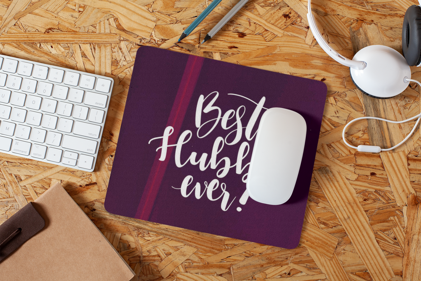 mousepad-mockup-lying-on-a-particle-board-desk-27561
