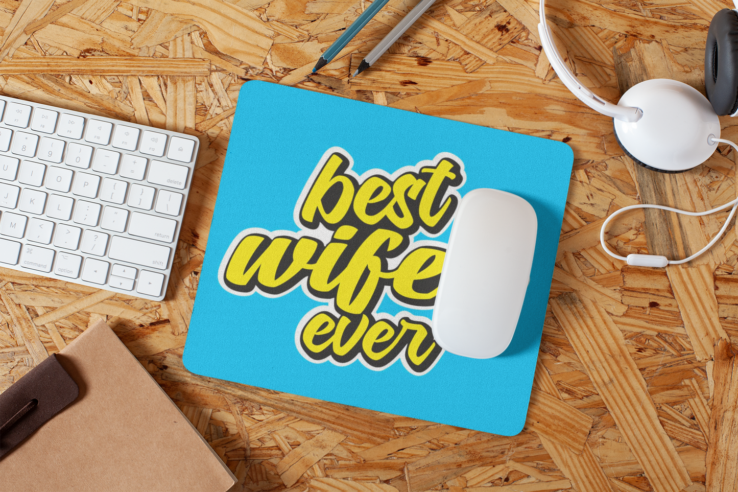mousepad-mockup-lying-on-a-particle-board-desk-27561