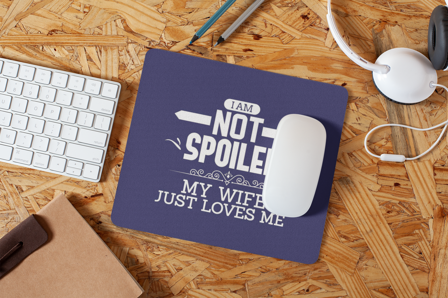 mousepad-mockup-lying-on-a-particle-board-desk-27561