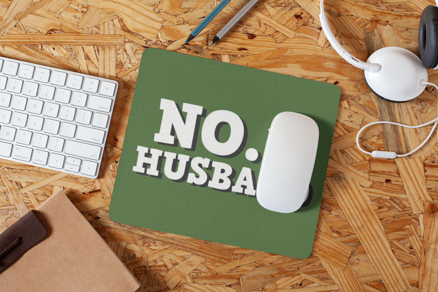 mousepad-mockup-lying-on-a-particle-board-desk-27561