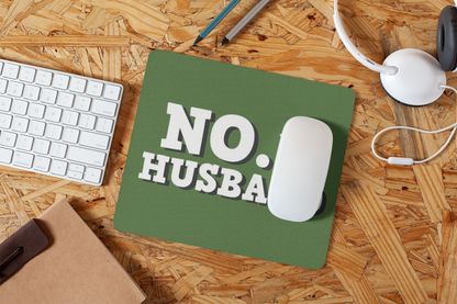 mousepad-mockup-lying-on-a-particle-board-desk-27561