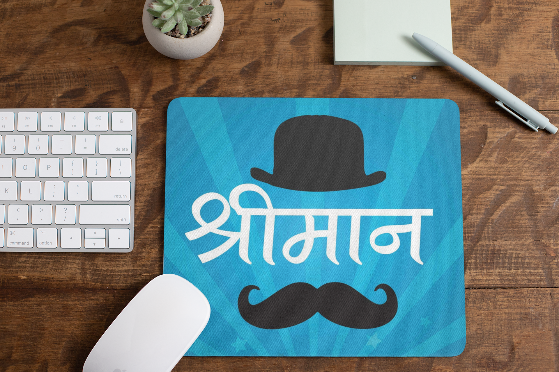 mousepad-mockup-lying-on-a-table-next-to-a-plant-pot-and-some-office-supplies-27553 (1)