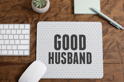mousepad-mockup-lying-on-a-table-next-to-a-plant-pot-and-some-office-supplies-27553