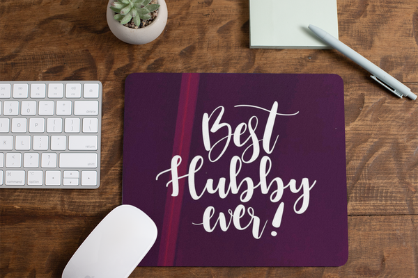 mousepad-mockup-lying-on-a-table-next-to-a-plant-pot-and-some-office-supplies-27553