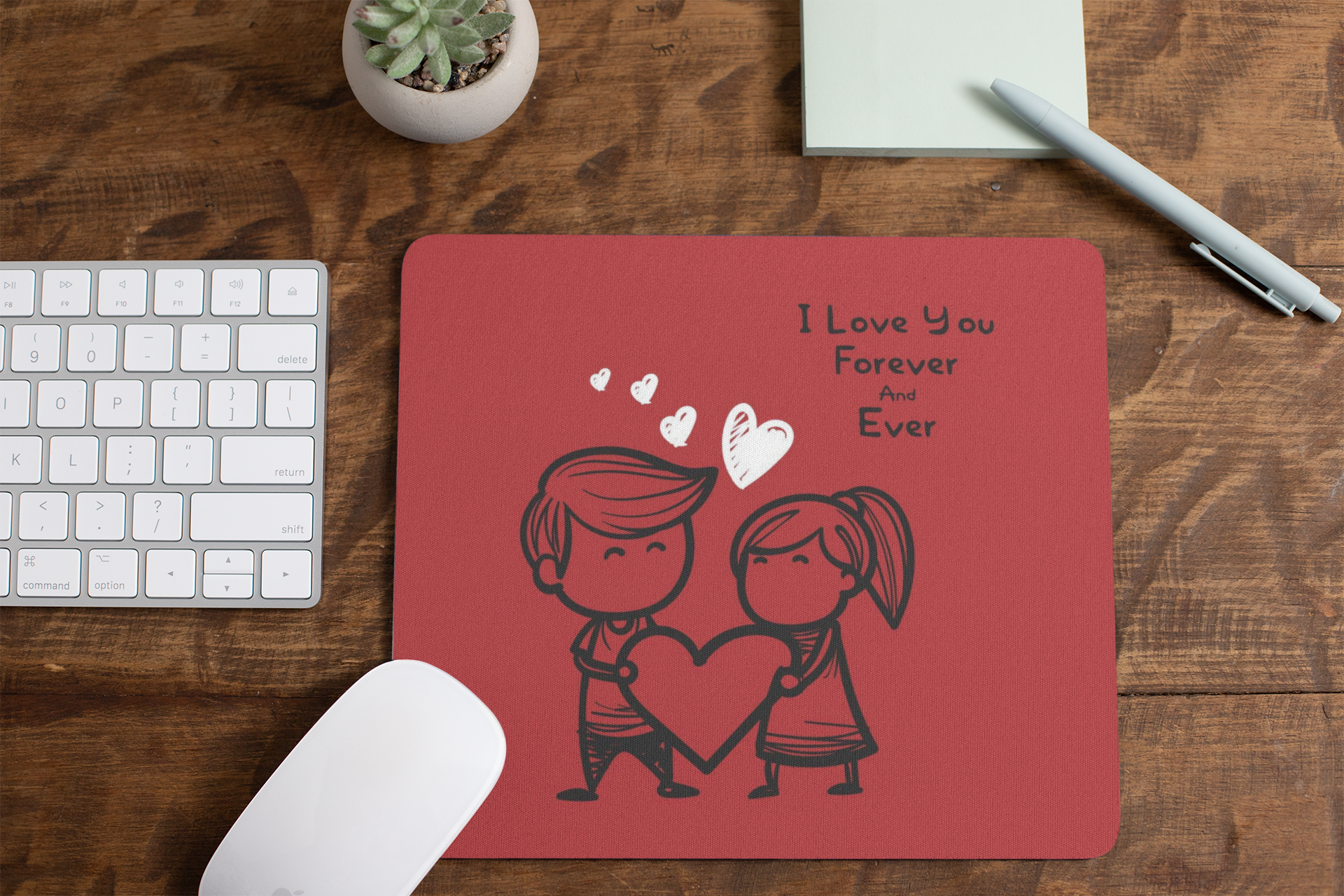 mousepad-mockup-lying-on-a-table-next-to-a-plant-pot-and-some-office-supplies-27553