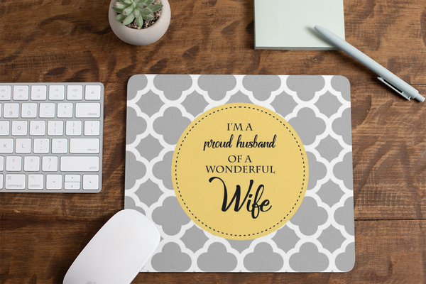 mousepad-mockup-lying-on-a-table-next-to-a-plant-pot-and-some-office-supplies-27553