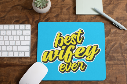 mousepad-mockup-lying-on-a-table-next-to-a-plant-pot-and-some-office-supplies-27553