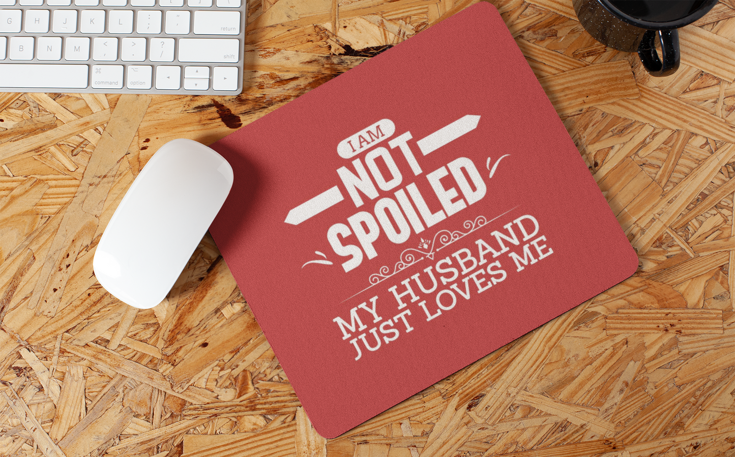 mousepad-mockup-lying-on-a-wooden-surface-27563