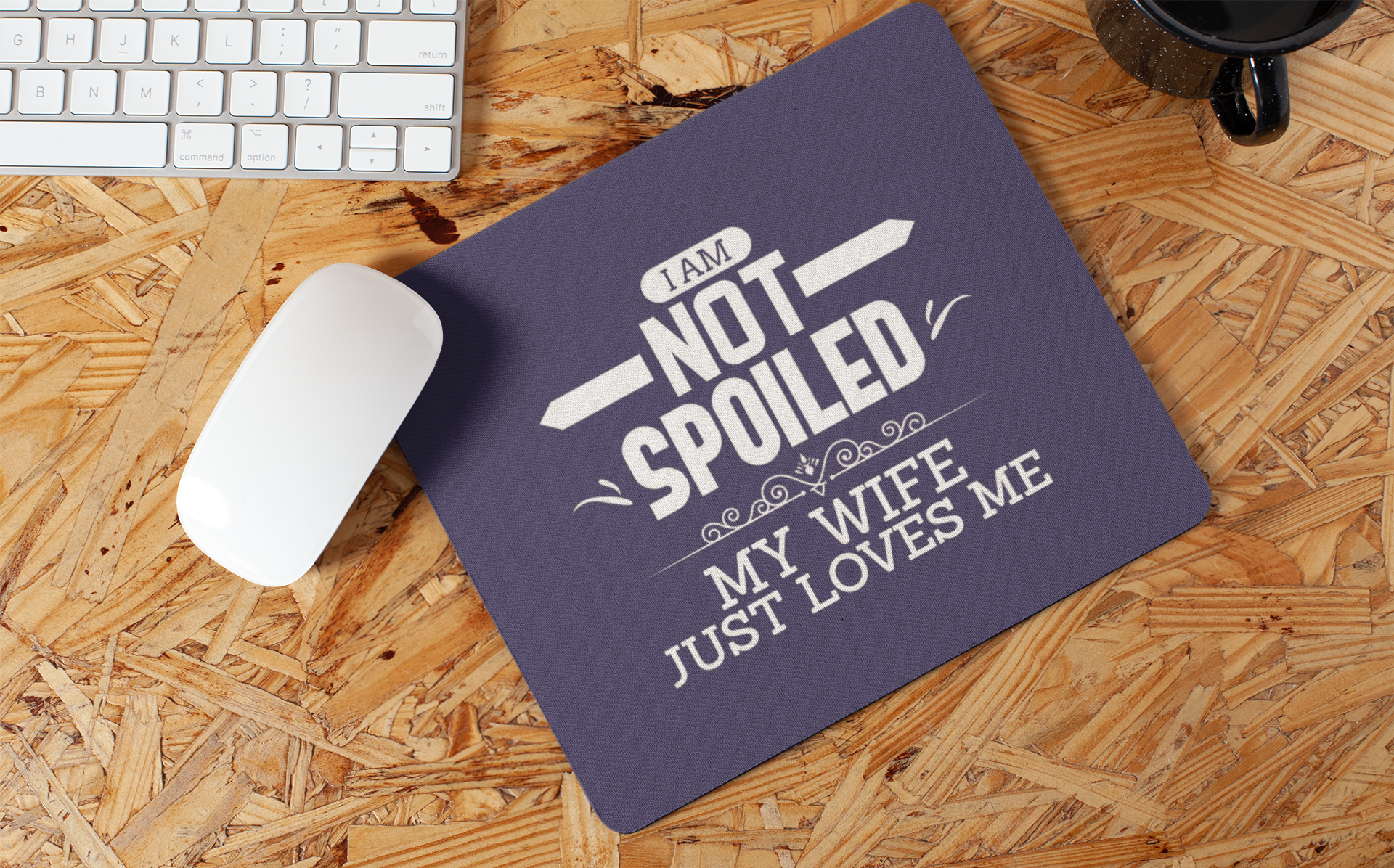 mousepad-mockup-lying-on-a-wooden-surface-27563