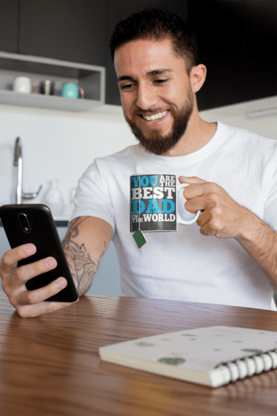 mug-mockup-of-a-tattooed-man-having-some-tea-at-home-24017-1