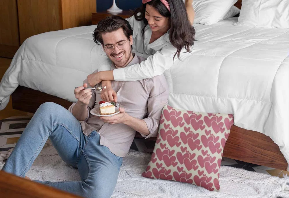 pillow-mockup-of-a-couple-eating-a-pie-in-the-bedroom-29018